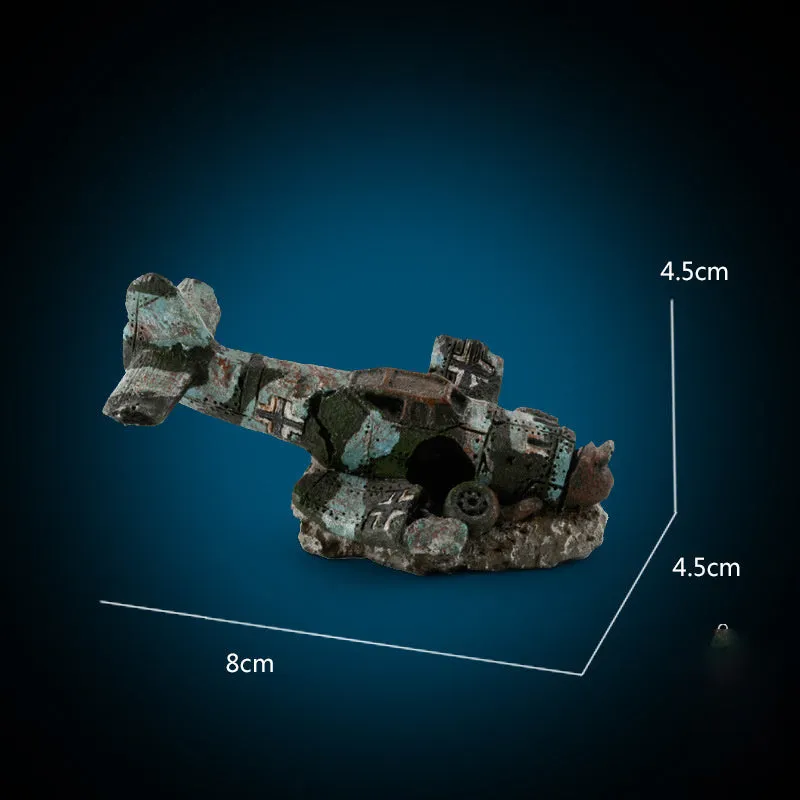 Resin aquarium ornament simulating aircraft wreckage, dimensions 8cm by 4.5cm by 4.5cm