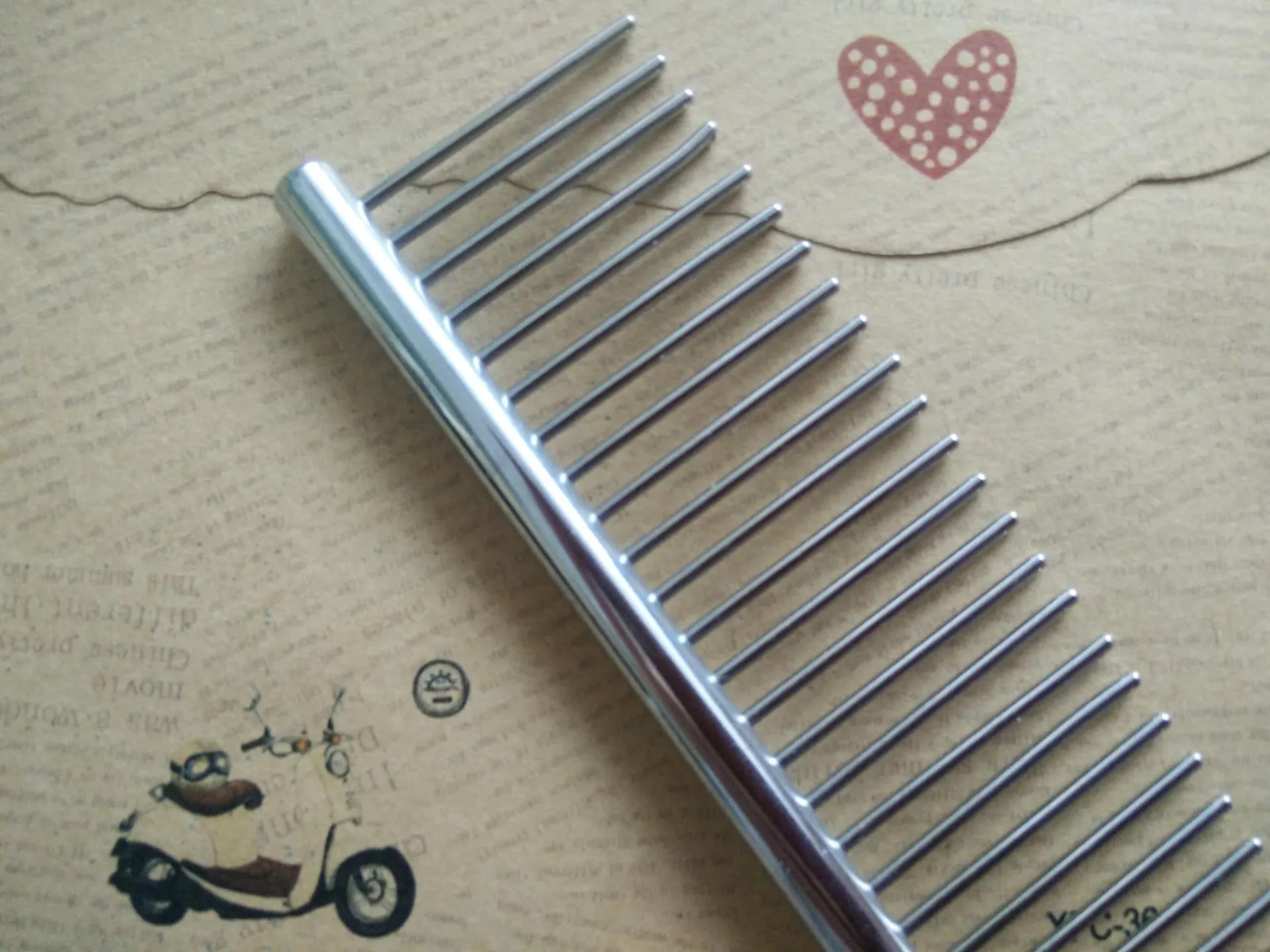 Steel pet grooming comb 19cm x 4.2cm round bar model 1942PY-1 on white background