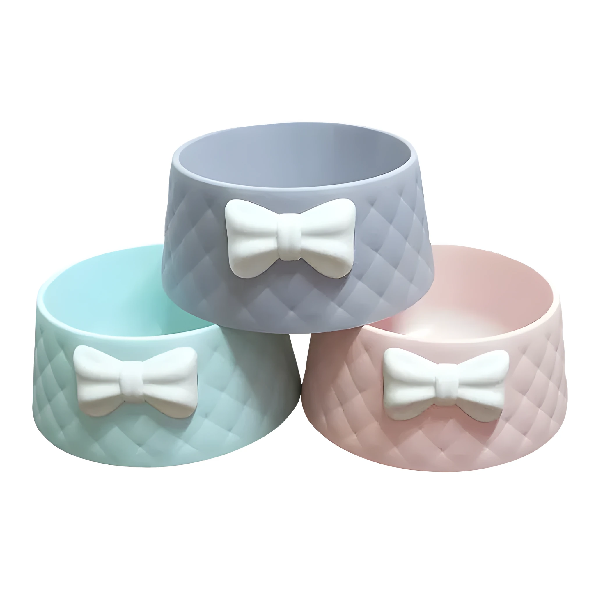 Bow shaped pet feeding bowl in PP plastic available in pink, green, and grey