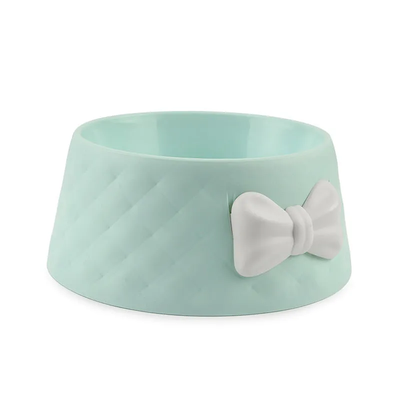 Bow shaped pet feeding bowl in PP plastic available in pink, green, and grey