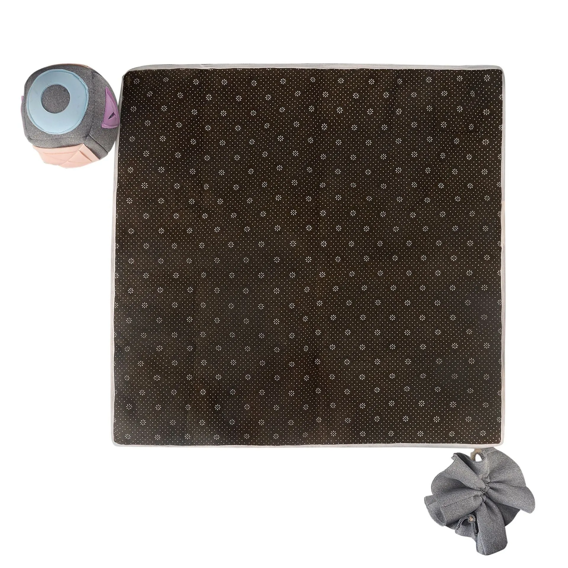 Grey cloth pet sniffing pad with two snuffle toys on a surface, designed for dog foraging and stress relief