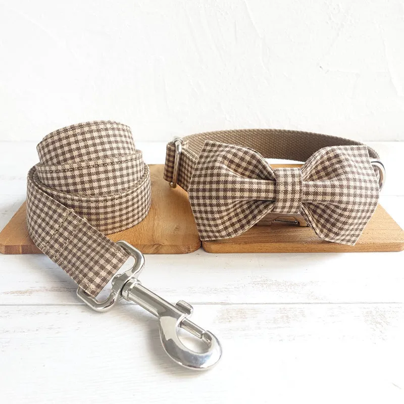 Pet leash and bow set in coffee grid polyester, available in sizes XS to XL