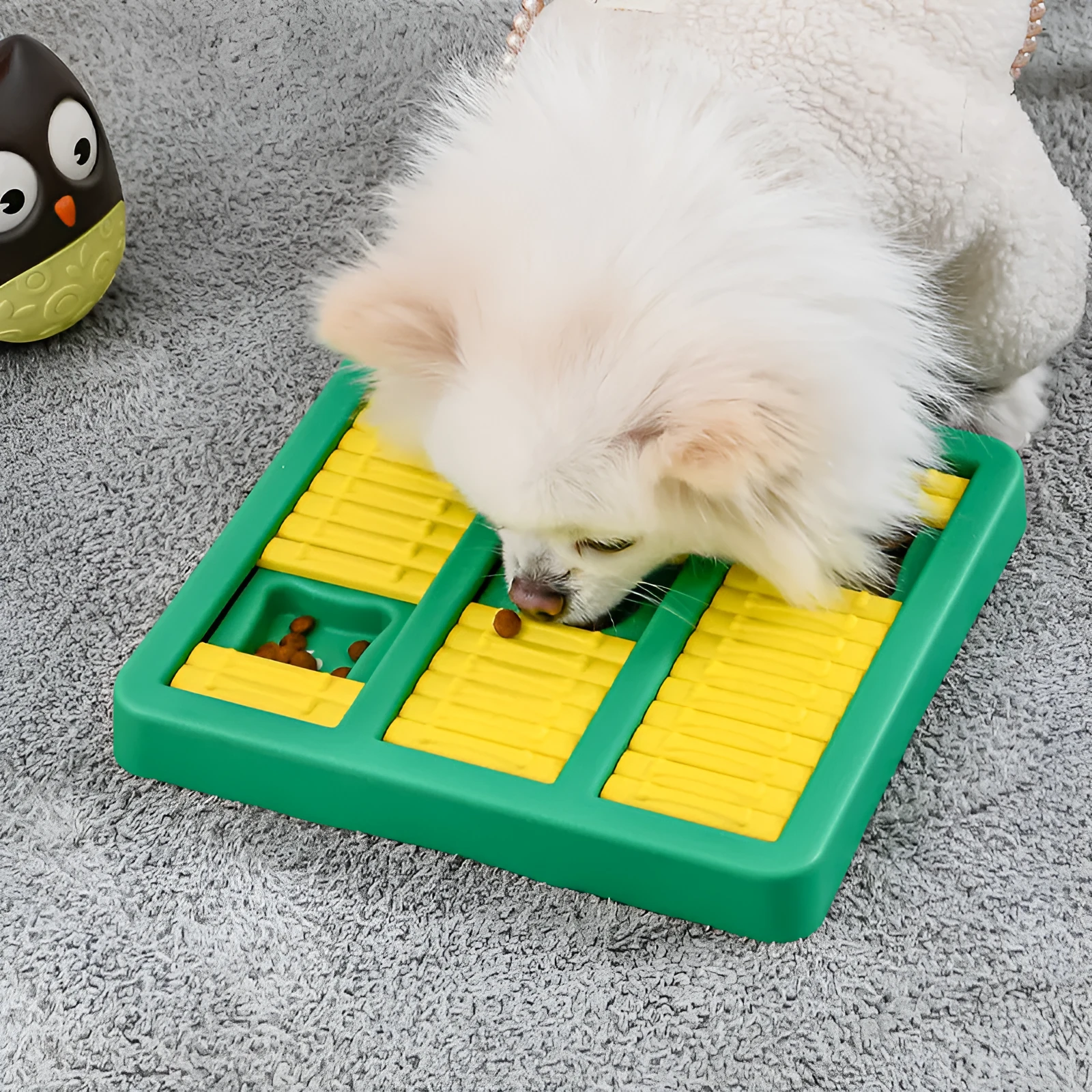 Lake blue plastic interactive puzzle dog toy on a light background