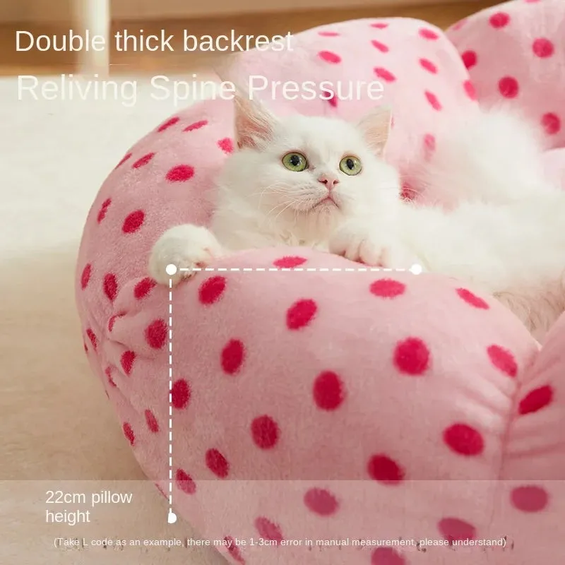 Pink dot pattern fabric cat bed shown in two circular sizes, 45cm and 65cm diameter.