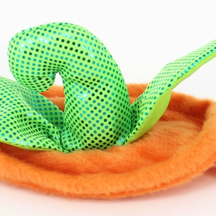 Yellow pumpkin Halloween pet costume with green leaf decoration on a cat wearing the hat and dress