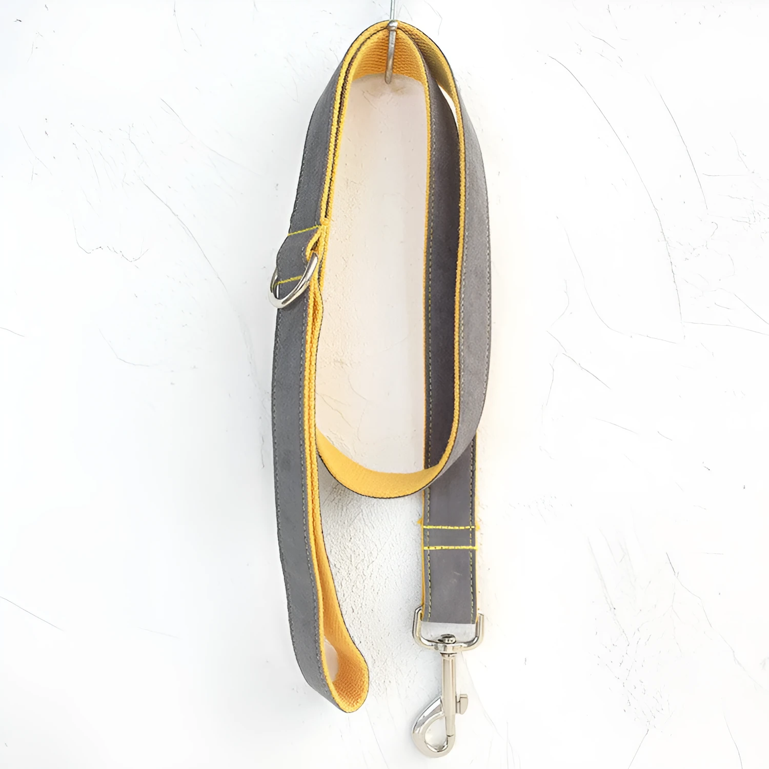Grey and yellow dog leash made from polyester fibre, shown on a flat surface, available in multiple sizes