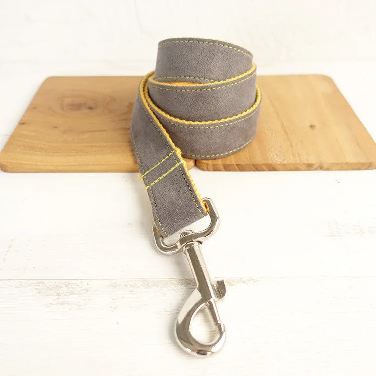 Grey and yellow dog leash made from polyester fibre, shown on a flat surface, available in multiple sizes