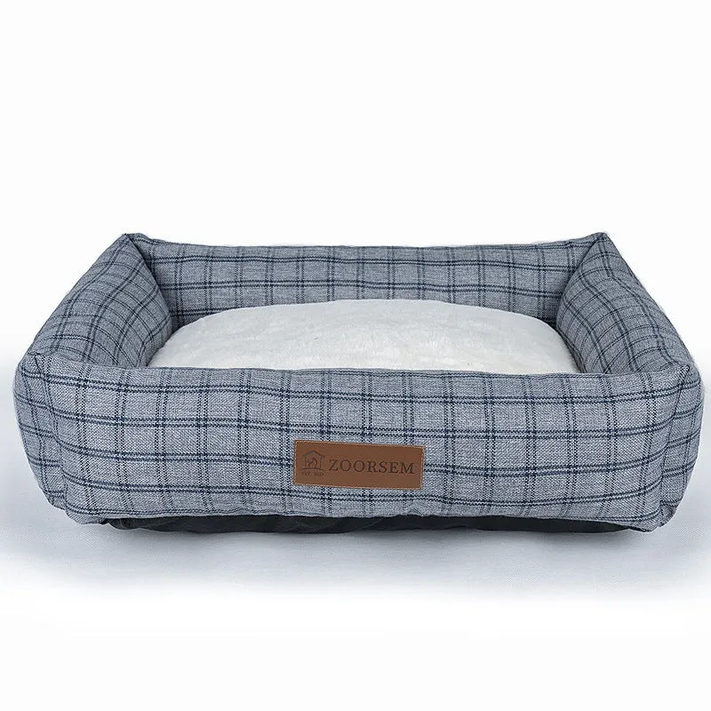 Square linen dog bed in brown plaid pattern showing four size options
