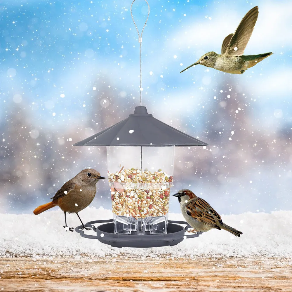 Collapsible wild birds feeder hanging birdcage with removable roof and large capacity bowls in outdoor garden setting