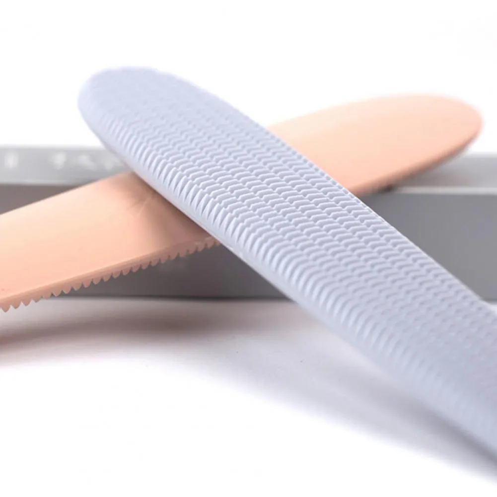 Gray ABS cat comb with tongue massage surface and ergonomic handle
