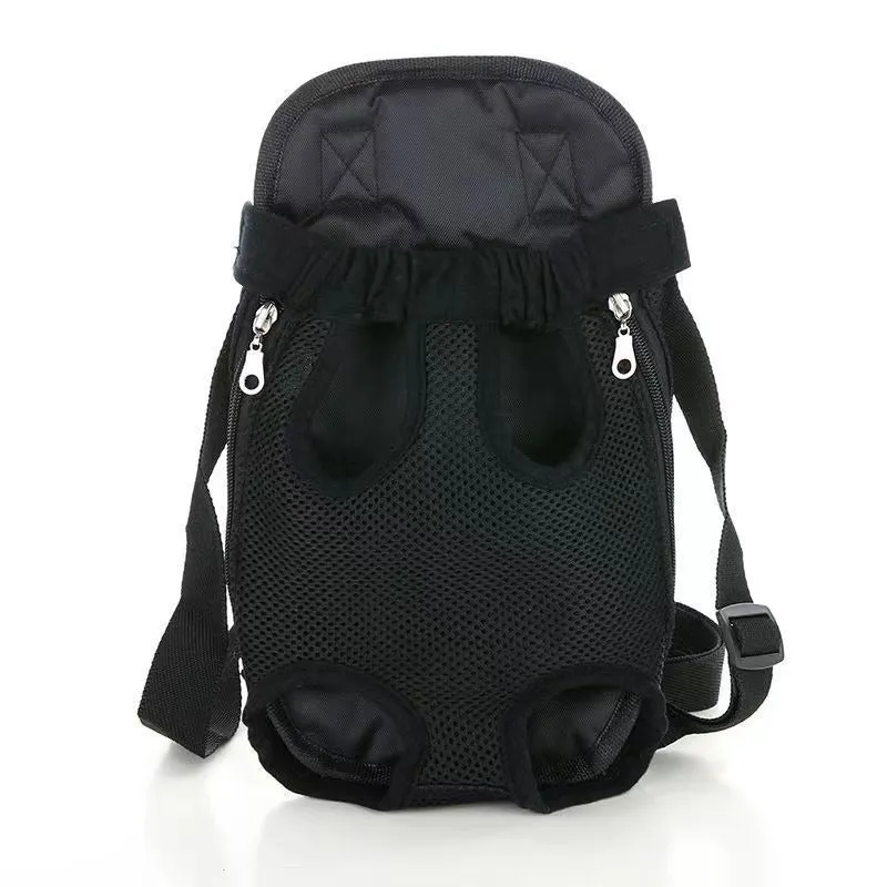 A small dog sitting in a breathable mesh carrier backpack worn on a person's front.