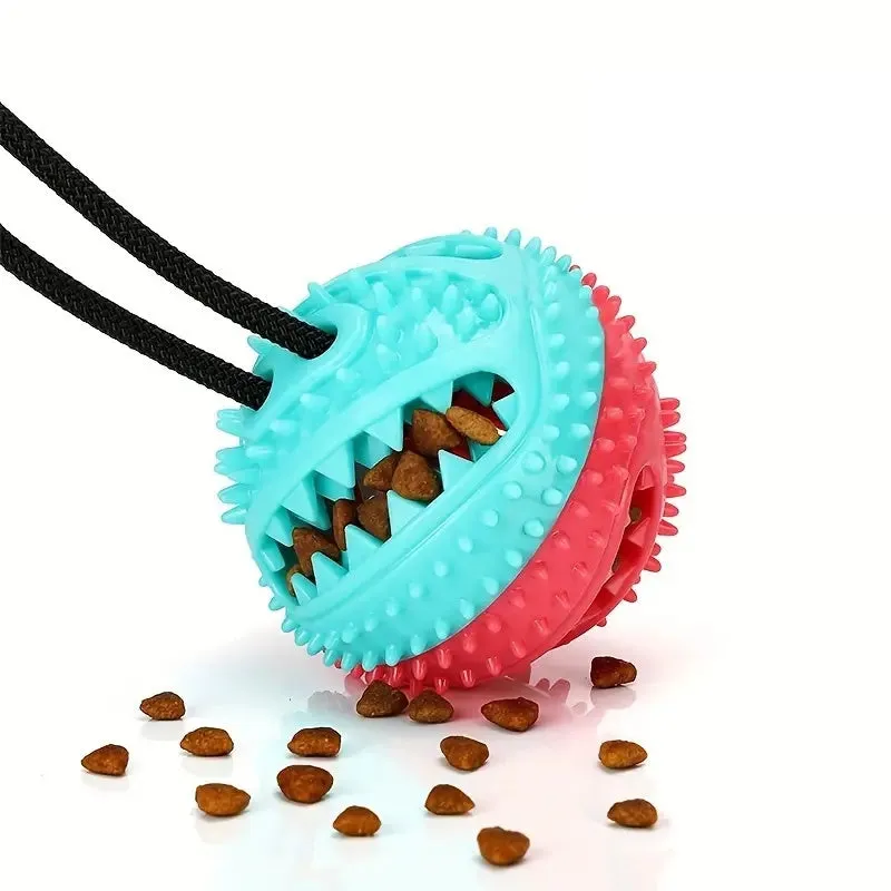Blue suction cup tug-of-war dog toy with rope and treat-dispensing ball for aggressive chewers