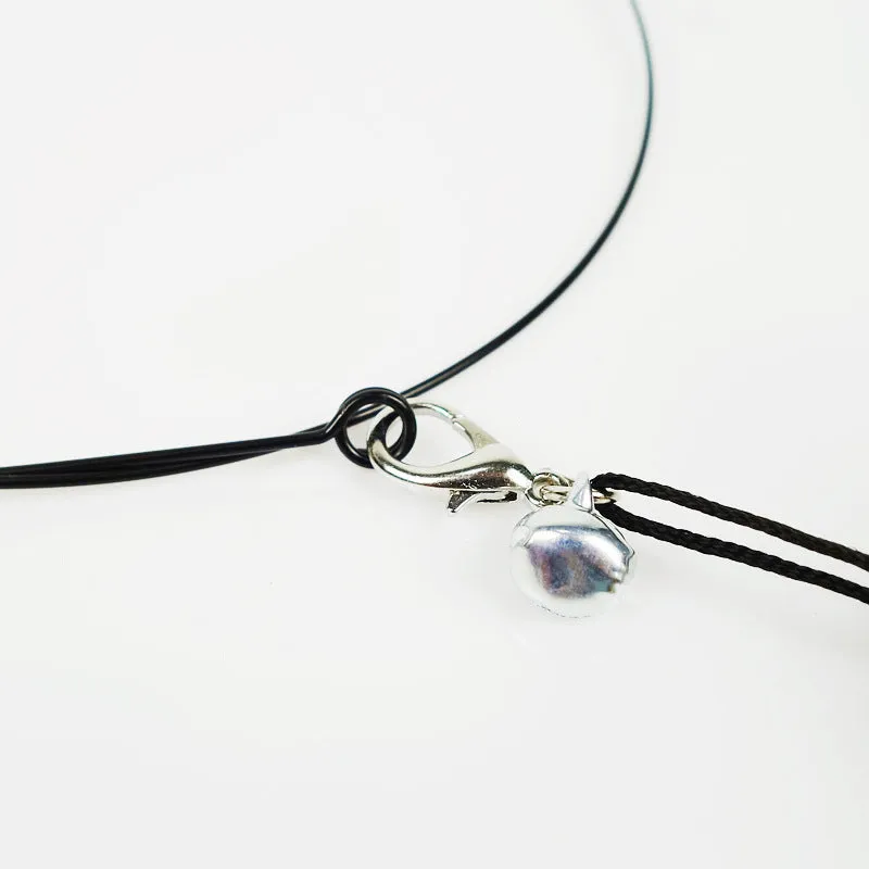 Black cat toy stick with bird feather wire end measuring half a metre in length