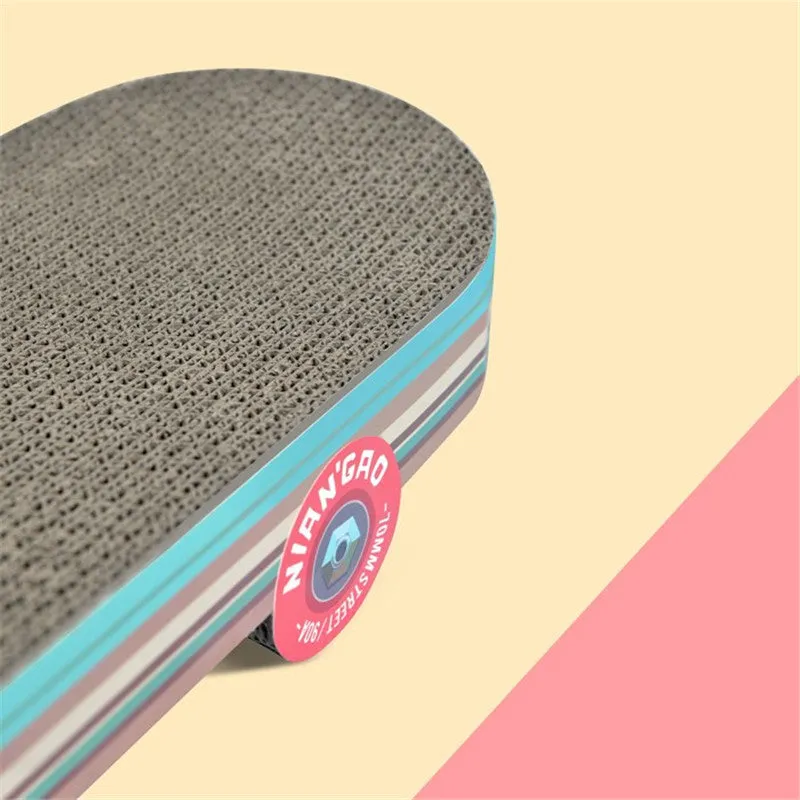 Rice Cake skateboard cat scratching board made of corrugated paper in picture colour for small cats