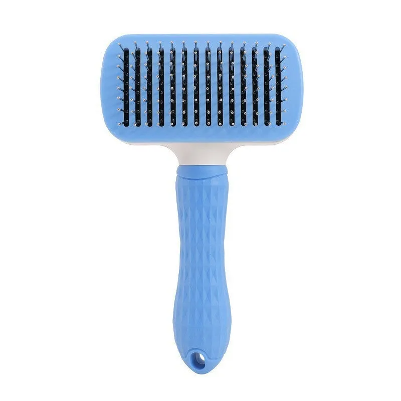 Blue self-cleaning pet comb with fine stainless steel teeth and rubber body on white background
