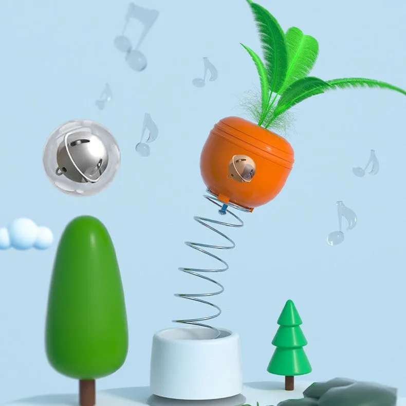 Carrot-shaped self-playing food-leaking tumbler cat toy on a light floor