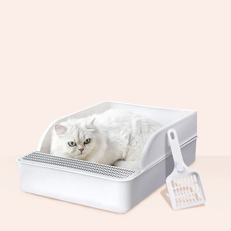 White semi-enclosed cat litter box size S made of PP plastic on a clean floor