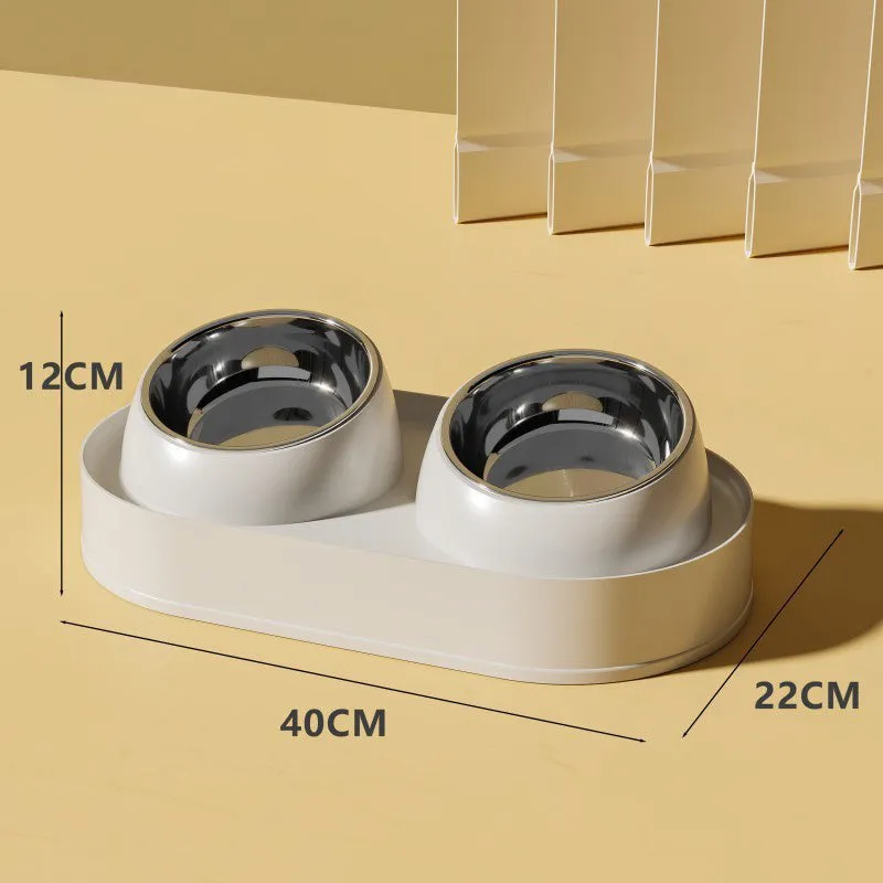 White elevated pet feeder with tilted ceramic bowls on a separate rack, for cats and small dogs.