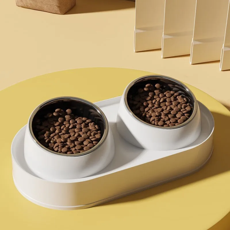 White elevated pet feeder with tilted ceramic bowls on a separate rack, for cats and small dogs.