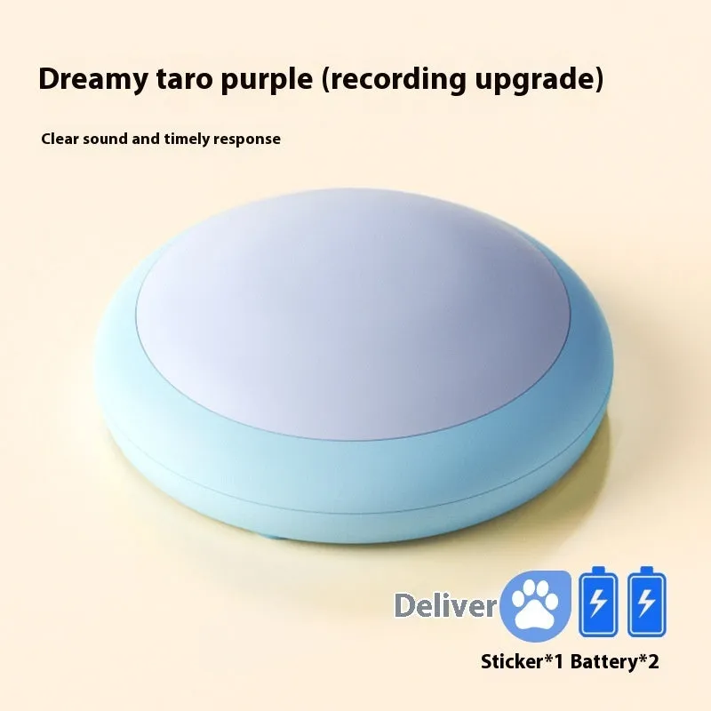 Plastic pet communication button dog voice toy in recording macaron purple on a flat surface