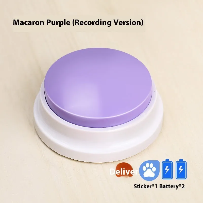 Plastic pet communication button dog voice toy in recording macaron purple on a flat surface