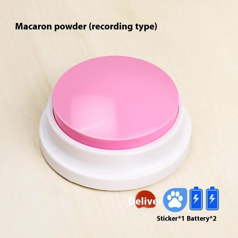 Plastic pet communication button dog voice toy in recording macaron purple on a flat surface