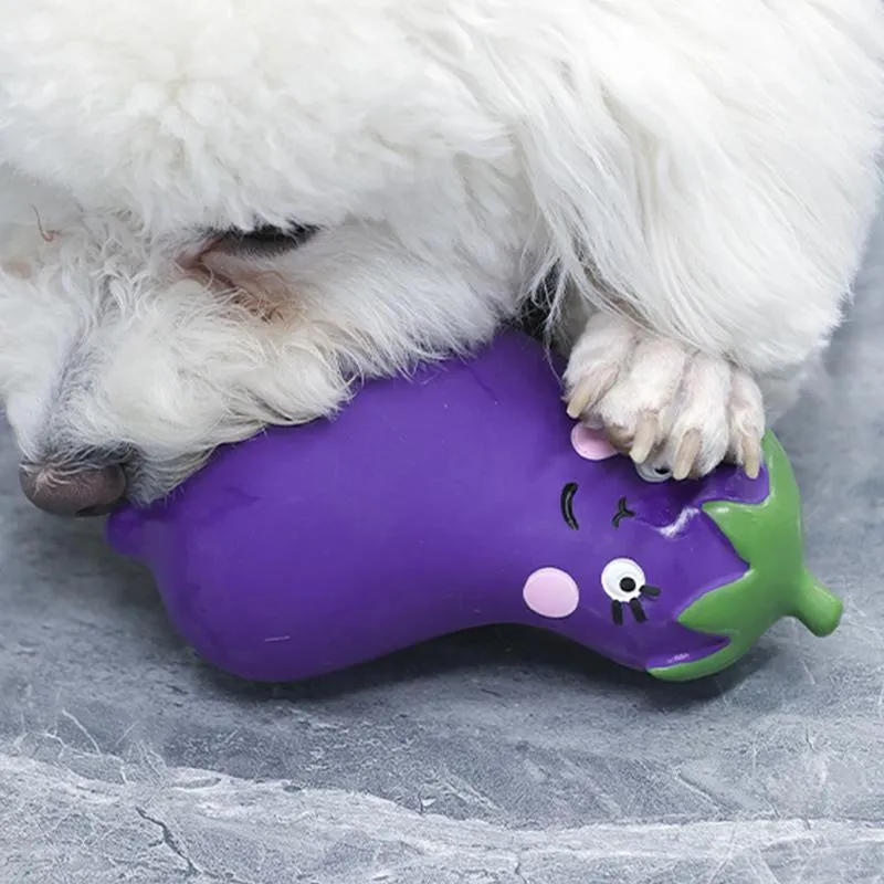Latex cartoon vegetable dog chew toy shaped like an onion and eggplant in green, orange, or purple.