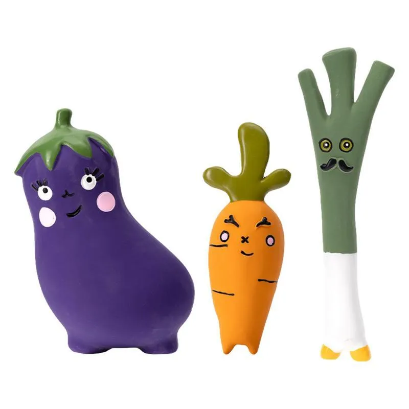 Latex cartoon vegetable dog chew toy shaped like an onion and eggplant in green, orange, or purple.