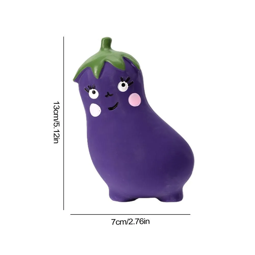 Latex cartoon vegetable dog chew toy shaped like an onion and eggplant in green, orange, or purple.