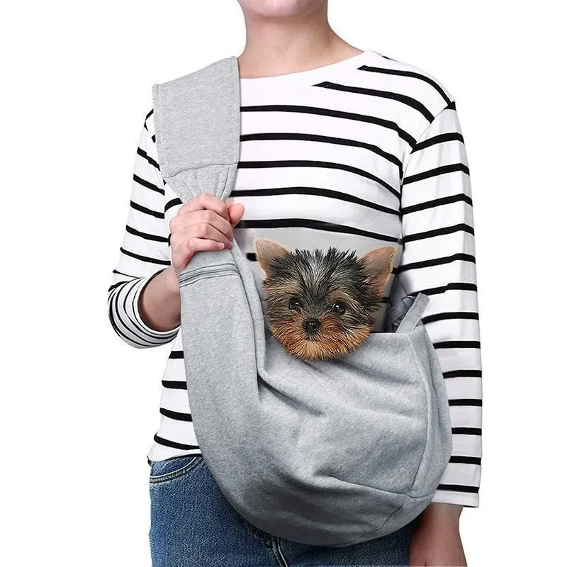 Fashion crossbody breathable folding pet bag in grey flannel with strap and zipper closure on plain background