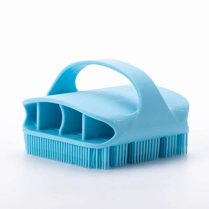 Blue silicone scalp massager brush with long bristles and a hand-through ergonomic handle.