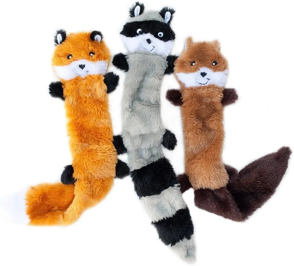 Set of three Peltz unstuffed squeaky dog toys - fox, raccoon, and squirrel - 18 inches long on white background