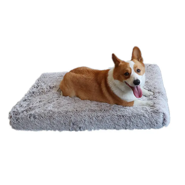 Plush square pet bed with wave memory foam in a gray colour on a wooden floor