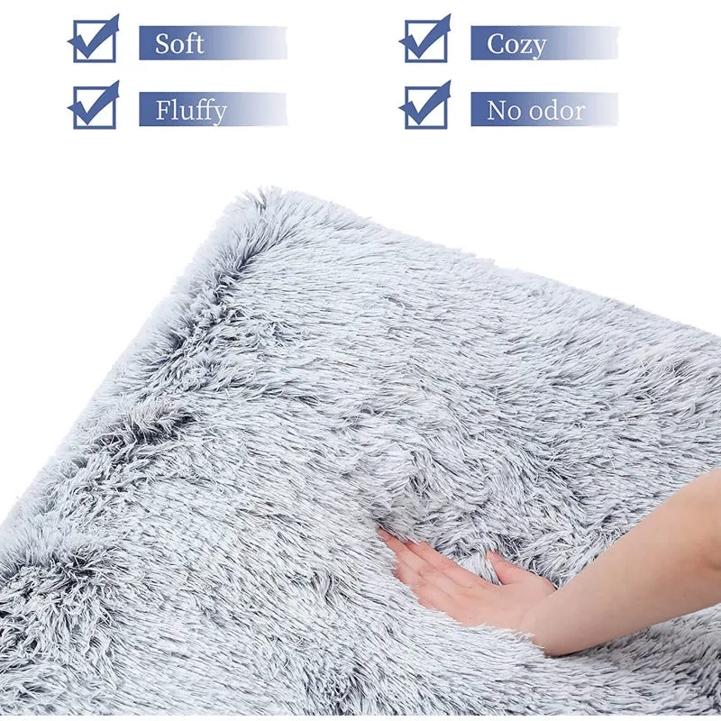 Plush square pet bed with wave memory foam in a gray colour on a wooden floor