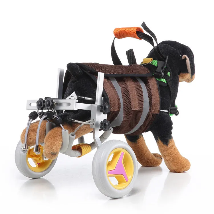 Grey dog wheelchair with adjustable frame, two wheels, and carrying handle on a light background