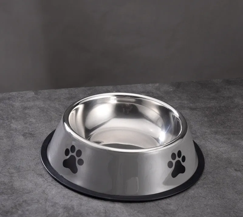 Printed non-slip stainless steel pet bowl for dogs and cats in gray, shown on a floor