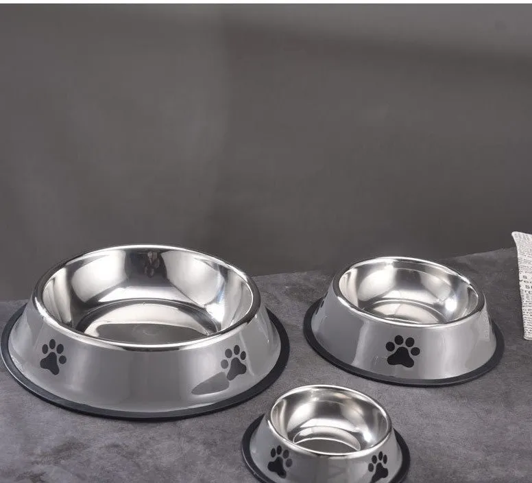 Printed non-slip stainless steel pet bowl for dogs and cats in gray, shown on a floor