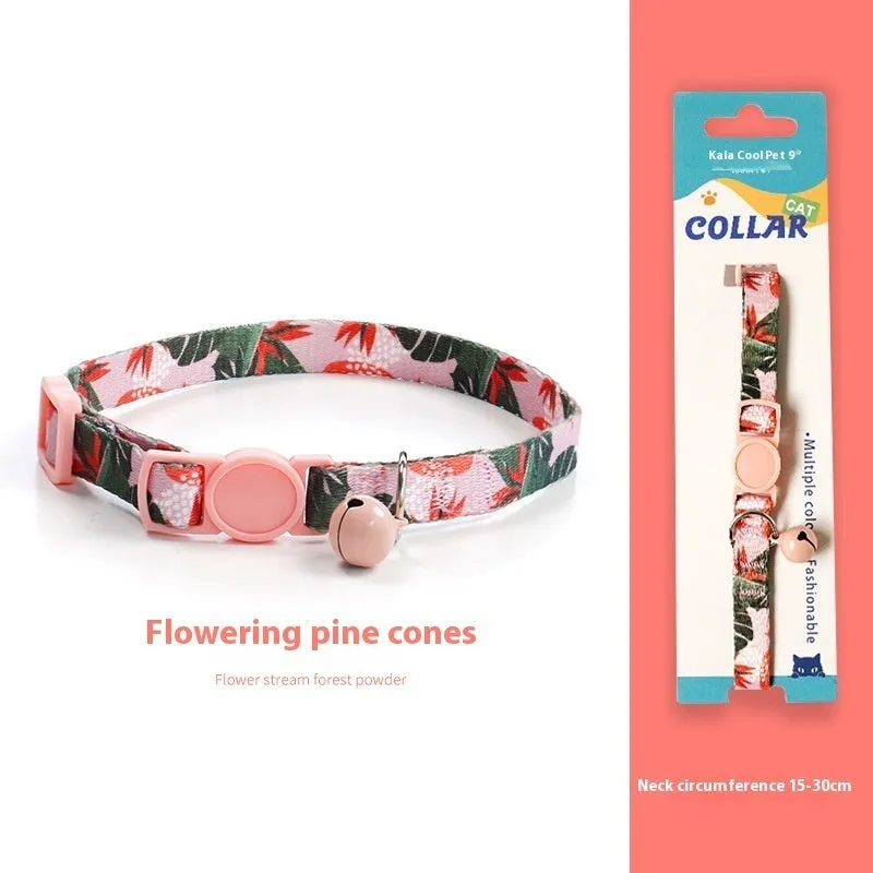 Woven polyester cat collar with anti-suffocation safety buckle and bell in green jungle colour grid pattern