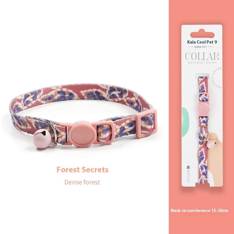 Woven polyester cat collar with anti-suffocation safety buckle and bell in green jungle colour grid pattern