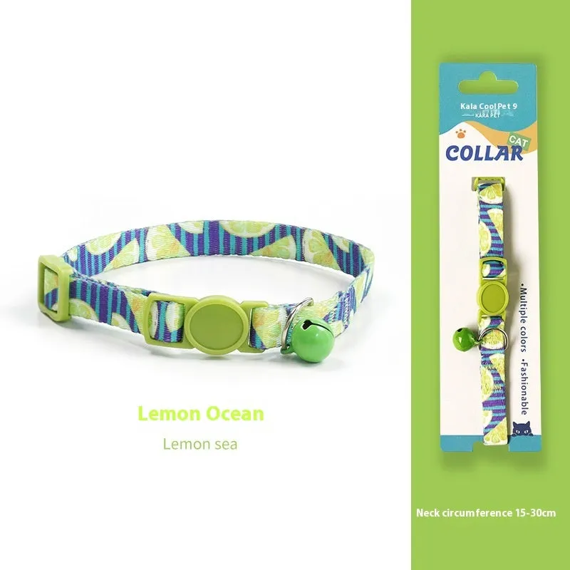 Woven polyester cat collar with anti-suffocation safety buckle and bell in green jungle colour grid pattern