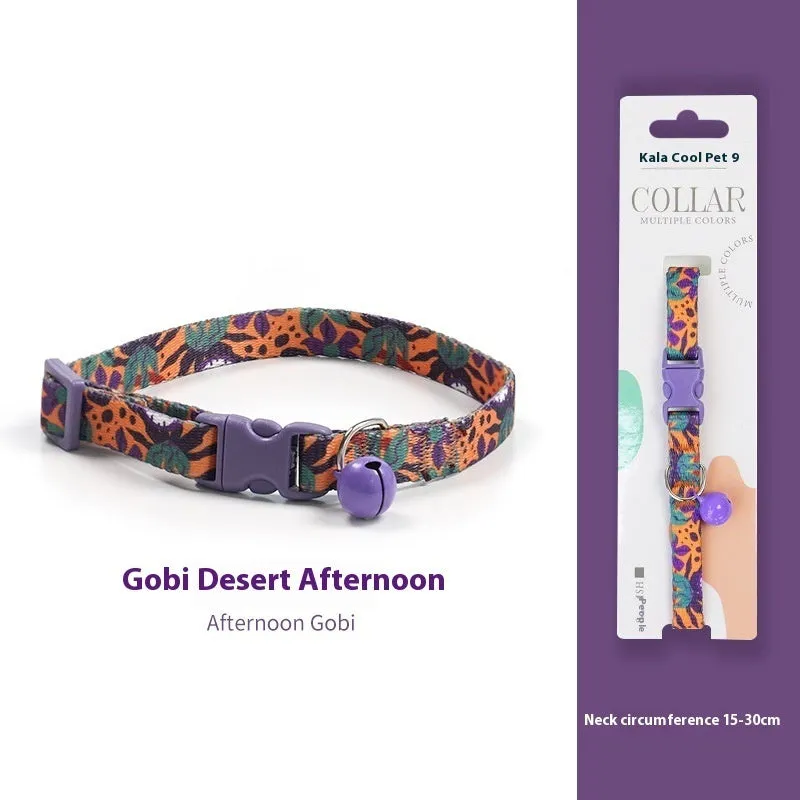 Woven polyester cat collar with anti-suffocation safety buckle and bell in green jungle colour grid pattern