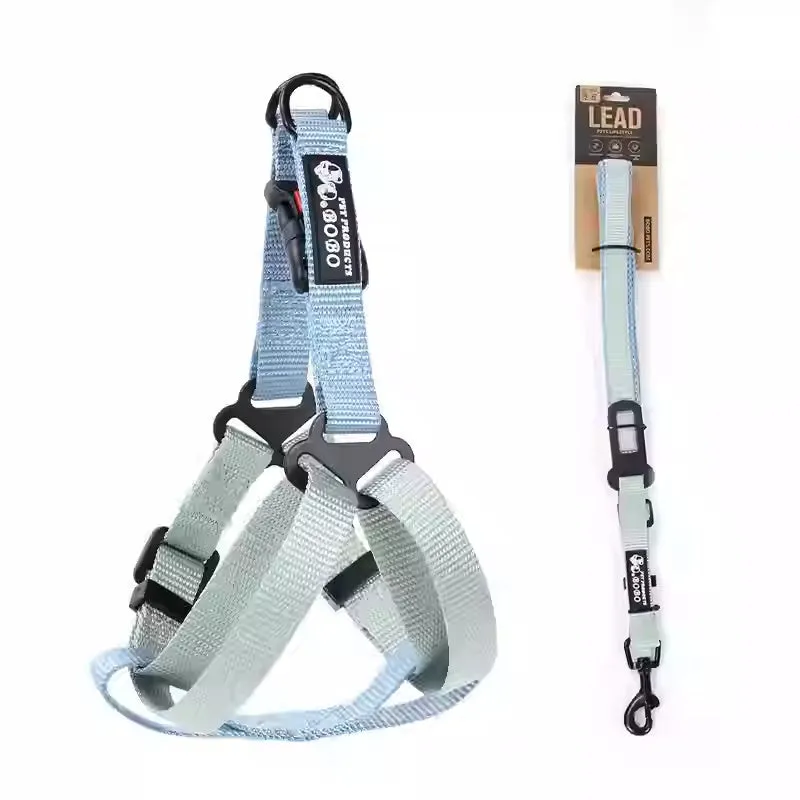 Nylon adjustable dog breast strap with hand holding rope in blue pink colour on white background