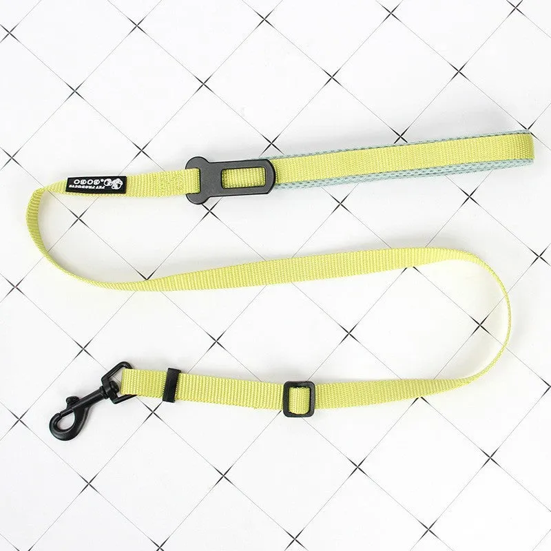 Nylon adjustable dog breast strap with hand holding rope in blue pink colour on white background