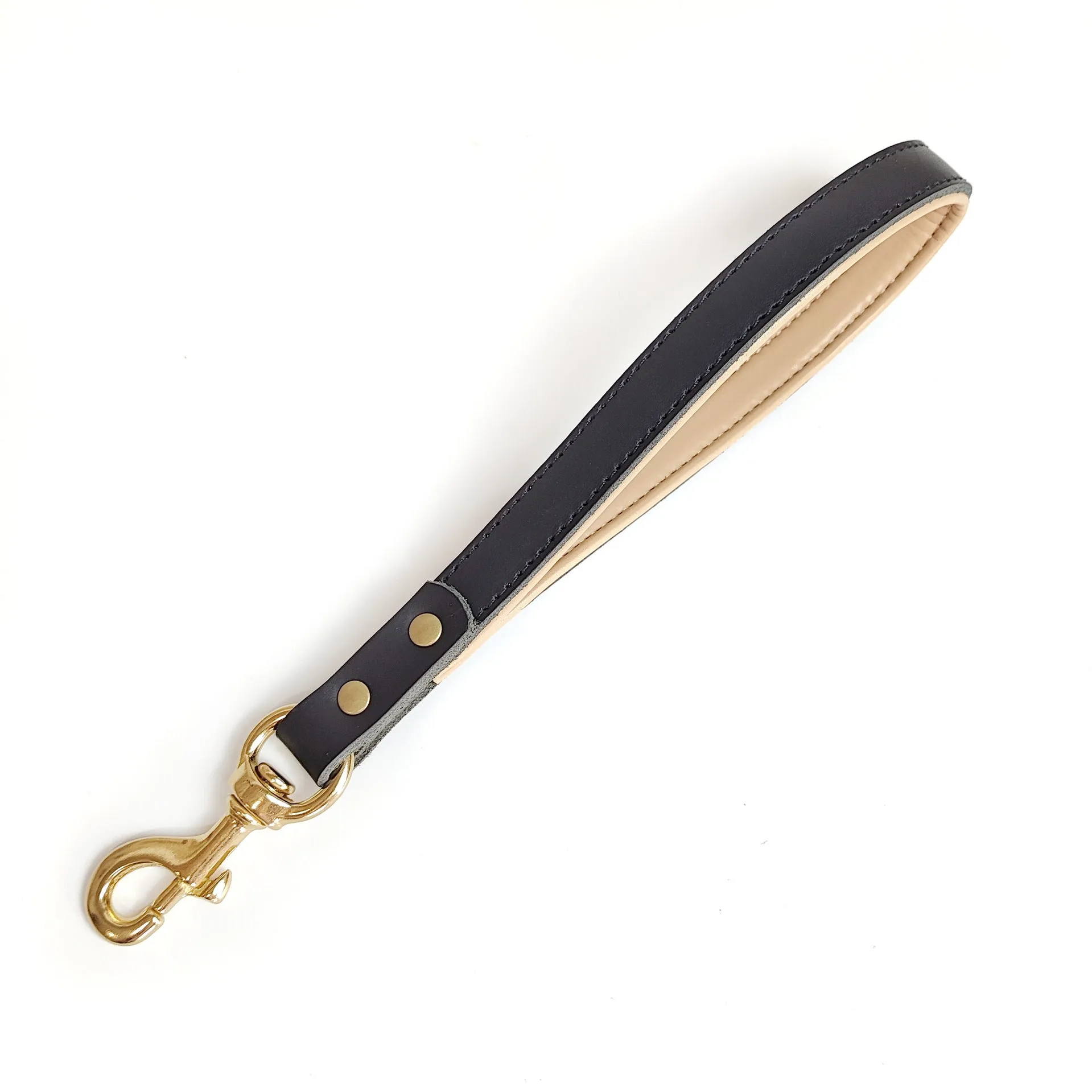 Black real cowhide leather dog hand holding rope 30x2cm on plain background
