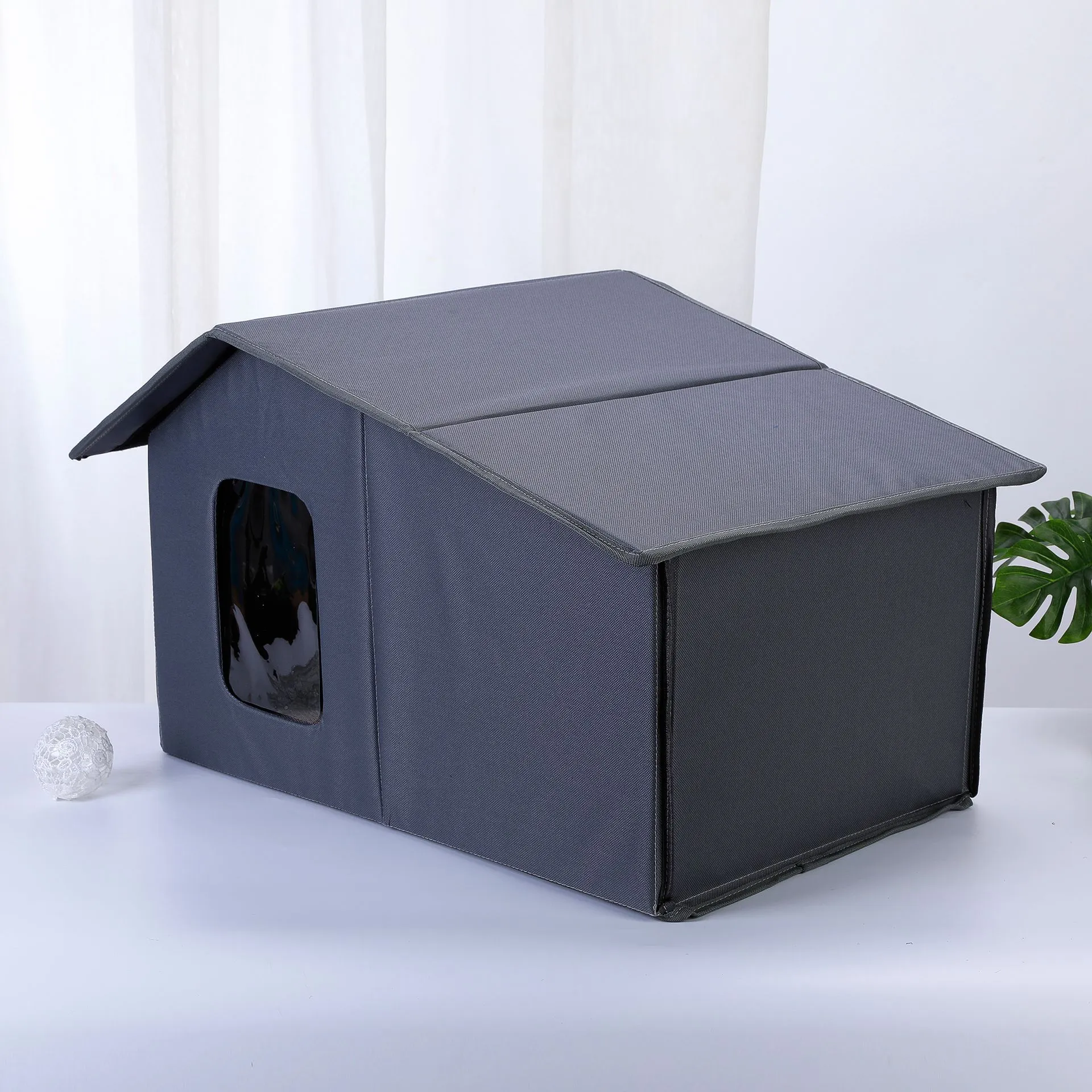 Outdoor waterproof cat nest in grey with removable Oxford cloth cover and perforated plate structure for cage use
