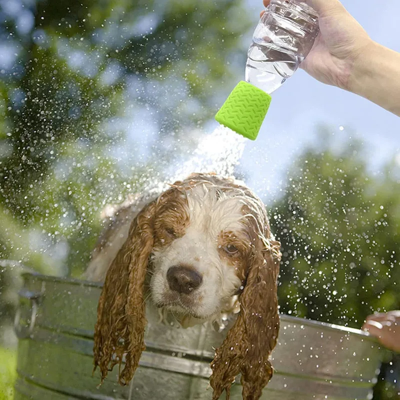 Silicone pet shower head in blue, green, and orange colours for portable dog and cat bathing