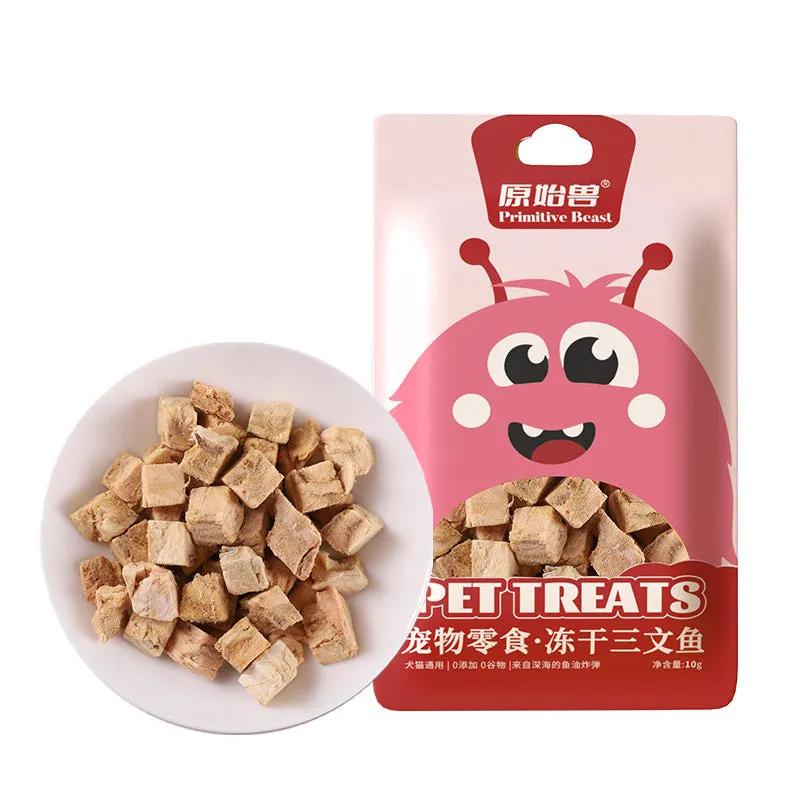 Assorted freeze-dried pet snacks including chicken, salmon and egg yolk flavours in small resealable bags.