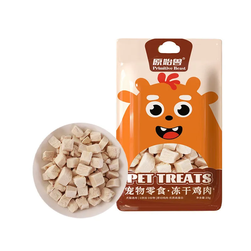 Assorted freeze-dried pet snacks including chicken, salmon and egg yolk flavours in small resealable bags.