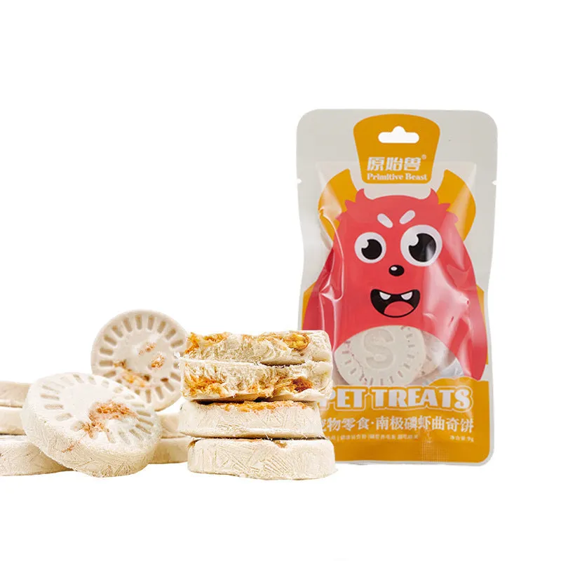 Assorted freeze-dried pet snacks including chicken, salmon and egg yolk flavours in small resealable bags.