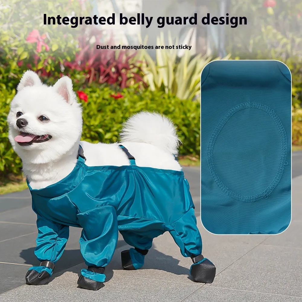 Peacock blue pet diaper bag belly jumpsuit made of waterproof memory cloth, laid flat showing foot-wrapped design